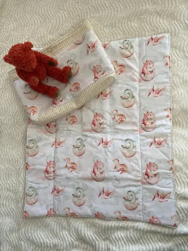 Tapis à langer nomade avec pochette dinosaures